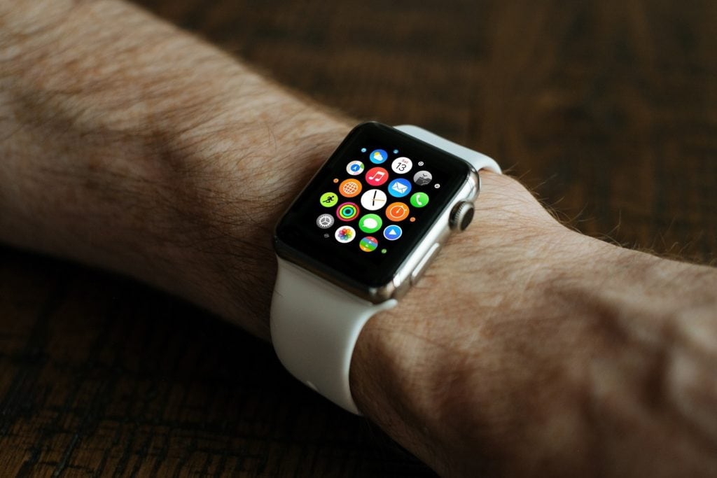 Apple Smart Watch on a hand, with applications showing.