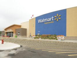 Walmart logo on the side of the supercentre.